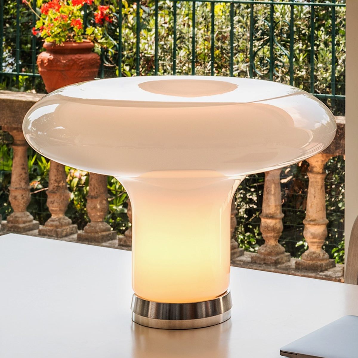 Artemide bird online lamp